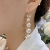 S925银针韩国蝴蝶结珍珠流苏个性时尚夸张气质百搭高级设计感耳扣耳饰